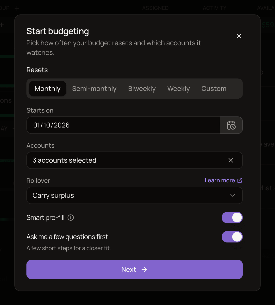 The Start budgeting window with Monthly selected under Resets, the Starts on date, three accounts selected, Carry surplus as the Rollover rule, the Smart pre-fill and Ask me a few questions first switches turned on, and the Next button.
